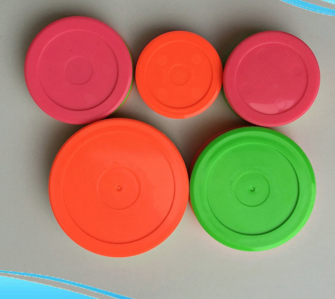 Premium Arcade Air Hockey Pucks | High-Speed Smooth Sliding Pucks for Commercial Tables | HomingGame Factory Direct Wholesale